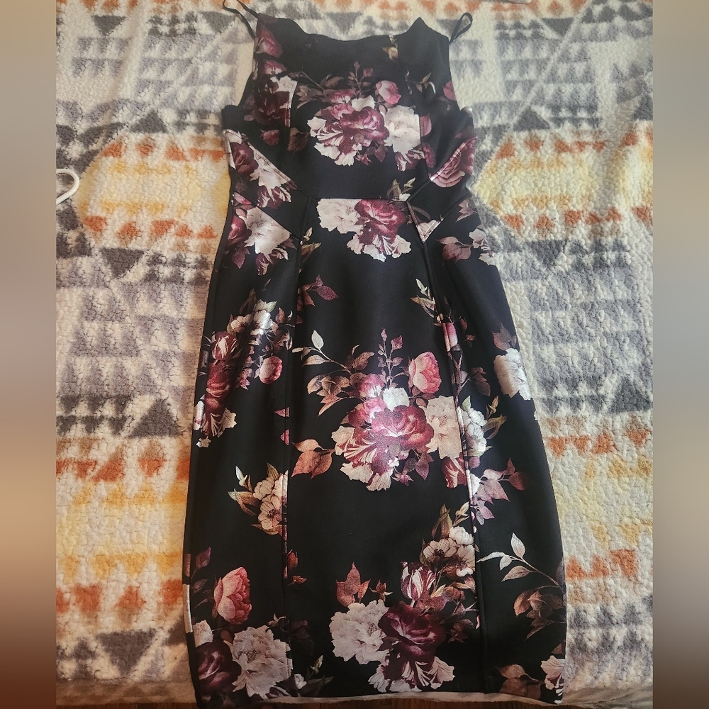 size 6 dress with red and silver flower print. From non-smoking home